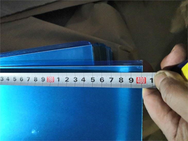 Aluminum sheet for corrugated roof plate door